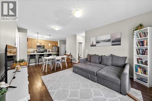 302, 200 Cranfield Common Se, Calgary, AB - Indoor Photo Showing Living Room