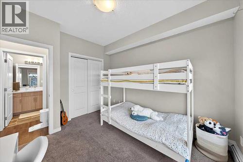 302, 200 Cranfield Common Se, Calgary, AB - Indoor Photo Showing Bedroom