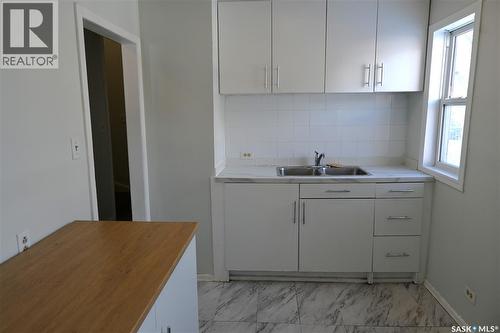4201 6Th Avenue, Regina, SK - Indoor Photo Showing Kitchen With Double Sink