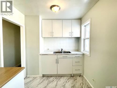 4201 6Th Avenue, Regina, SK - Indoor Photo Showing Kitchen With Double Sink
