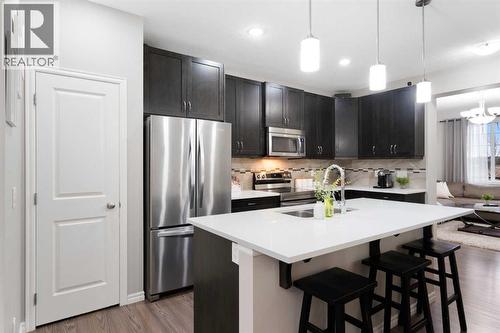 1529 Legacy Circle Se, Calgary, AB - Indoor Photo Showing Kitchen With Stainless Steel Kitchen With Upgraded Kitchen