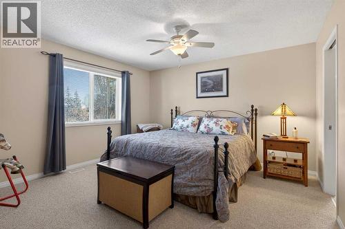 Primary Bedroom - 627 Auburn Bay Heights Se, Calgary, AB - Indoor Photo Showing Bedroom