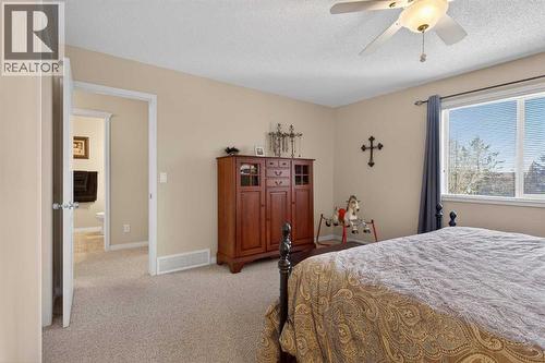 Primary Bedroom - 627 Auburn Bay Heights Se, Calgary, AB - Indoor Photo Showing Bedroom