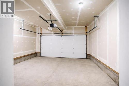 113 Corner Meadows Square Ne, Calgary, AB - Indoor Photo Showing Garage