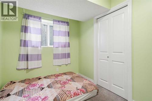 80 Taradale Drive S, Calgary, AB - Indoor Photo Showing Bedroom