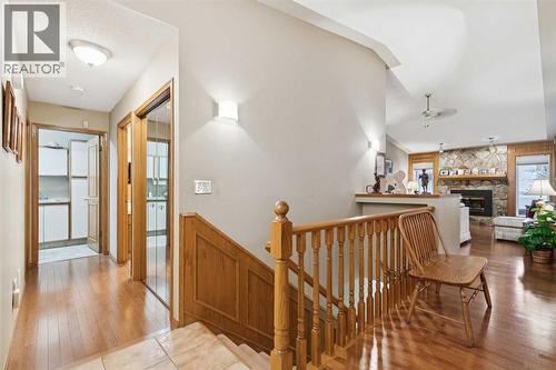 1025 Shawnee Road Sw, Calgary, AB - Indoor Photo Showing Other Room With Fireplace