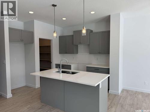 319 Cowessess Road, Saskatoon, SK - Indoor Photo Showing Kitchen With Double Sink With Upgraded Kitchen