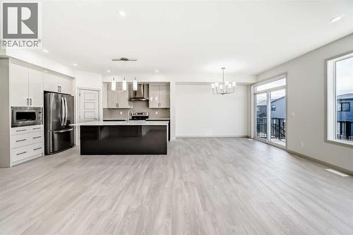 31 Lucas Passage Nw, Calgary, AB - Indoor Photo Showing Kitchen With Upgraded Kitchen
