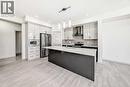 31 Lucas Passage Nw, Calgary, AB  - Indoor Photo Showing Kitchen With Upgraded Kitchen 