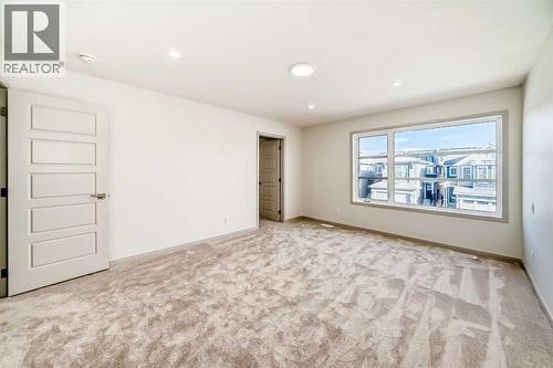 31 Lucas Passage Nw, Calgary, AB - Indoor Photo Showing Other Room