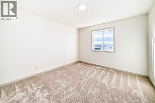 31 Lucas Passage Nw, Calgary, AB - Indoor Photo Showing Other Room