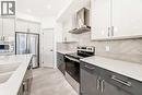 31 Lucas Passage Nw, Calgary, AB  - Indoor Photo Showing Kitchen With Upgraded Kitchen 