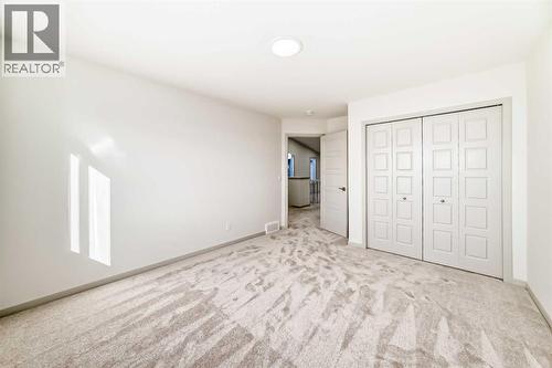 31 Lucas Passage Nw, Calgary, AB - Indoor Photo Showing Other Room