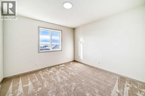 31 Lucas Passage Nw, Calgary, AB - Indoor Photo Showing Other Room