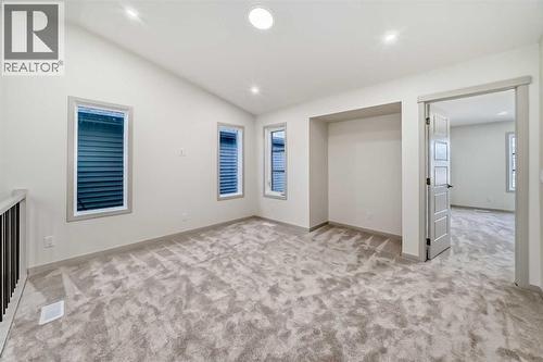 31 Lucas Passage Nw, Calgary, AB - Indoor Photo Showing Other Room