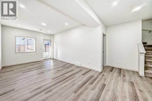 31 Lucas Passage Nw, Calgary, AB - Indoor Photo Showing Other Room