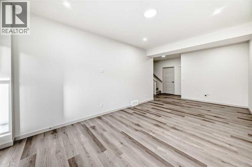 31 Lucas Passage Nw, Calgary, AB - Indoor Photo Showing Other Room