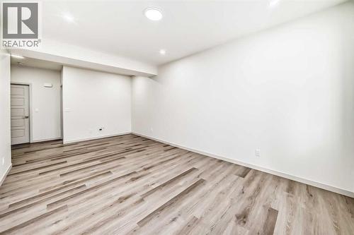 31 Lucas Passage Nw, Calgary, AB - Indoor Photo Showing Other Room