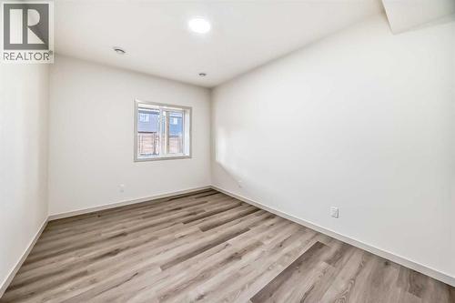 31 Lucas Passage Nw, Calgary, AB - Indoor Photo Showing Other Room
