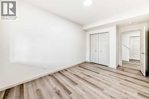 31 Lucas Passage Nw, Calgary, AB - Indoor Photo Showing Other Room