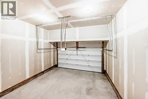 31 Lucas Passage Nw, Calgary, AB - Indoor Photo Showing Garage