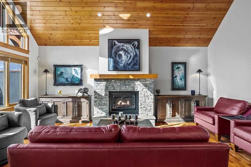 7 Creekside Mews, Canmore, AB - Indoor Photo Showing Living Room With Fireplace