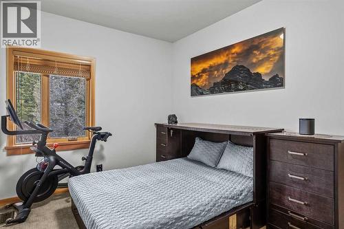 7 Creekside Mews, Canmore, AB - Indoor Photo Showing Bedroom