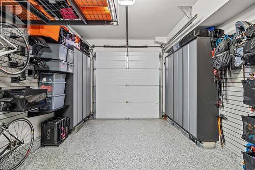 7 Creekside Mews, Canmore, AB - Indoor Photo Showing Garage