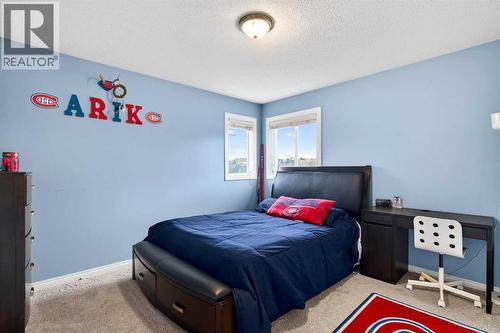 69 Elkton Way Sw, Calgary, AB - Indoor Photo Showing Bedroom