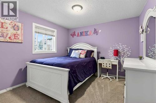 69 Elkton Way Sw, Calgary, AB - Indoor Photo Showing Bedroom