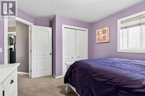69 Elkton Way Sw, Calgary, AB - Indoor Photo Showing Bedroom