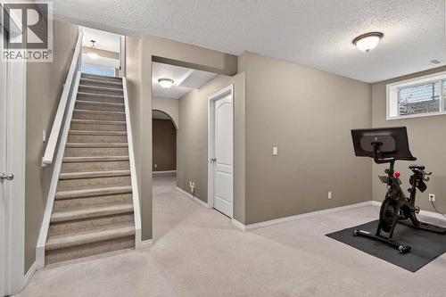 69 Elkton Way Sw, Calgary, AB - Indoor Photo Showing Gym Room