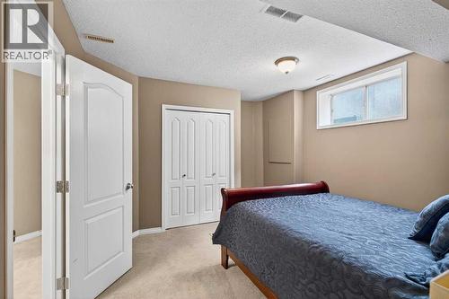69 Elkton Way Sw, Calgary, AB - Indoor Photo Showing Bedroom