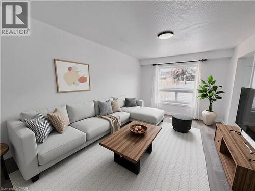 Virtually Staged - 303 Bankside Drive, Kitchener, ON - Indoor Photo Showing Living Room