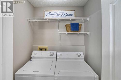 134 Hamptons Heath Nw, Calgary, AB - Indoor Photo Showing Laundry Room