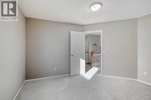 134 Hamptons Heath Nw, Calgary, AB - Indoor Photo Showing Other Room