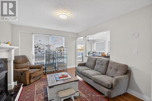 5 Giffin Road, Hamilton, ON - Indoor Photo Showing Living Room With Fireplace
