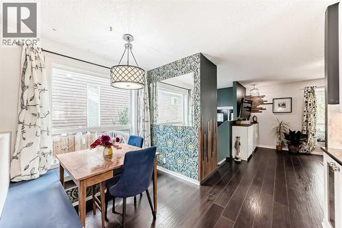 dining room with bench seating - 12 Taraglen Road Ne, Calgary, AB - Indoor Photo Showing Dining Room