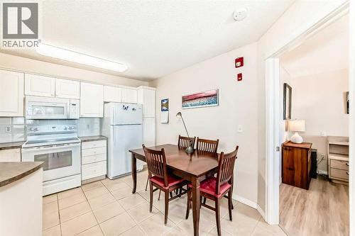 111, 6900 Hunterview Drive Nw, Calgary, AB - Indoor Photo Showing Kitchen