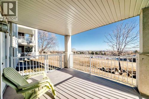 111, 6900 Hunterview Drive Nw, Calgary, AB - Outdoor With Deck Patio Veranda