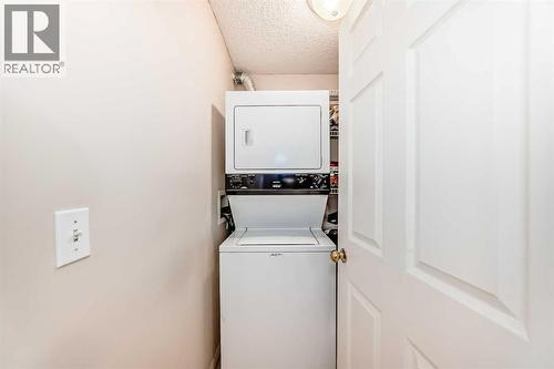 111, 6900 Hunterview Drive Nw, Calgary, AB - Indoor Photo Showing Laundry Room