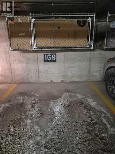 111, 6900 Hunterview Drive Nw, Calgary, AB - Indoor Photo Showing Garage