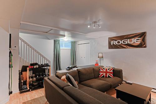 Family room - 586 Rue Gérard-Proulx, Saint-Eustache, QC - Indoor