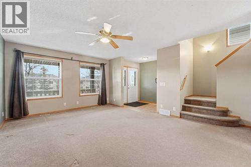905 Arbour Lake Road Nw, Calgary, AB - Indoor Photo Showing Other Room