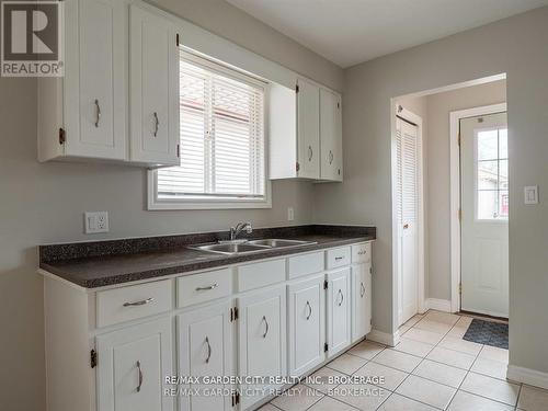 9 Churchill Street, St. Catharines (Western Hill), ON - Indoor Photo Showing Kitchen With Double Sink