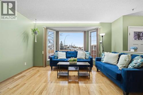 24 Laguna Close Ne, Calgary, AB - Indoor Photo Showing Living Room