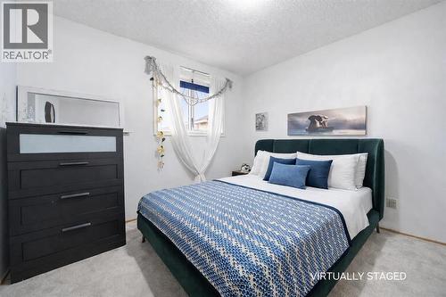 VIRTUAL IMAGE - 24 Laguna Close Ne, Calgary, AB - Indoor Photo Showing Bedroom