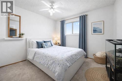VIRTUAL IMAGE - 24 Laguna Close Ne, Calgary, AB - Indoor Photo Showing Bedroom