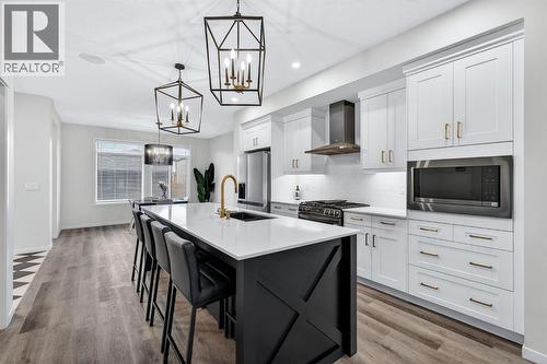 413 Belmont Park Sw, Calgary, AB - Indoor Photo Showing Kitchen With Upgraded Kitchen