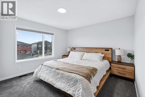 413 Belmont Park Sw, Calgary, AB - Indoor Photo Showing Bedroom